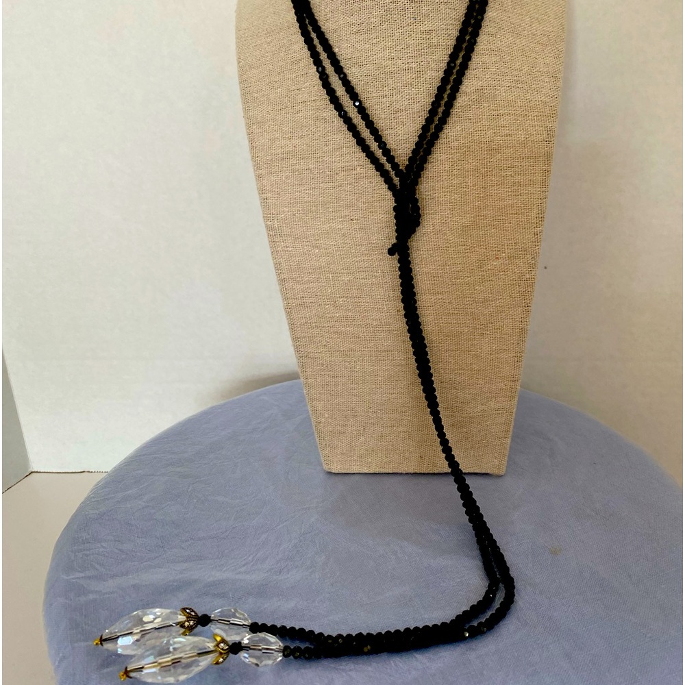 Heidi Daus jet black faceted Swarovski crystals ending in 2 large clear ones.